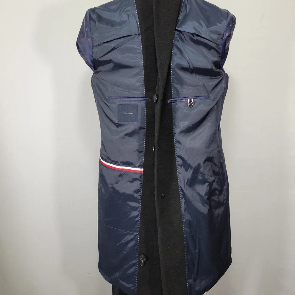 Tommy Hilfiger before completing
